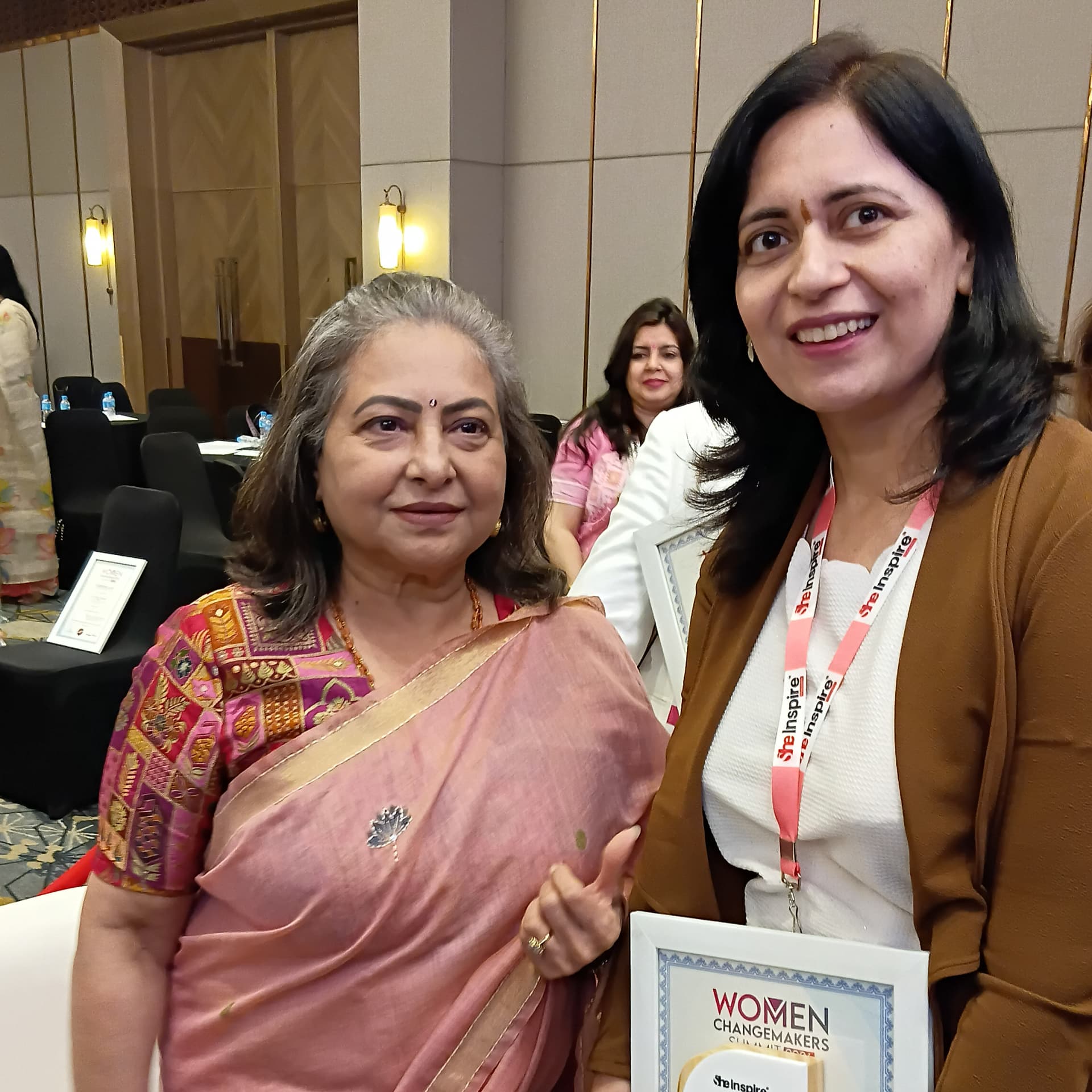 Dr. Simpi Nanda receiving the Women in Leadership Award at Women Changemakers Summit 2026